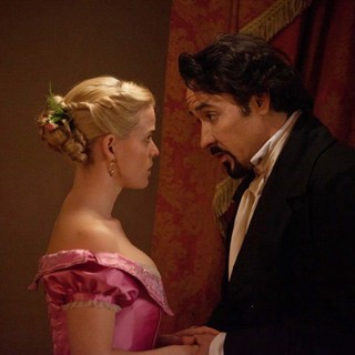 Alice Eve stars as Emily and John Cusack stars as Edgar Allan Poe in Relativity Media's The Raven (2012)