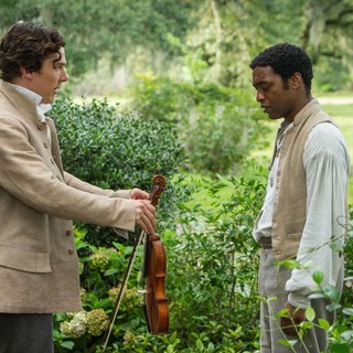 Benedict Cumberbatch stars as William Ford and Chiwetel Ejiofor stars as Solomon Northup in Fox Searchlight Pictures' 12 Years a Slave (2013)