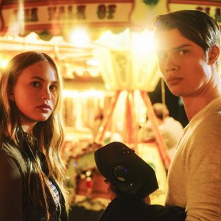 Tallulah Evans stars as Jan and Nicholas Galitzine stars as Mark in Lifetime's The Watcher in the Woods (2017)
