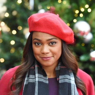 Tatyana Ali stars as Heather Nash in Lifetime's Wrapped Up in Christmas (2017)