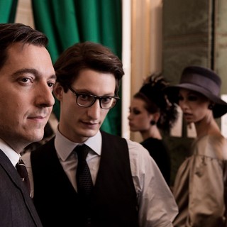 Guillaume Gallienne stars as Pierre Berge and Pierre Niney stars as Yves Saint Laurent in The Weinstein Company's Yves Saint Laurent (2014)