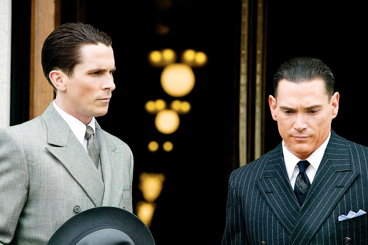 Christian Bale stars as Melvin Purvis and Billy Crudup stars as J. Edgar Hoover in Universal Pictures' Public Enemies (2009)