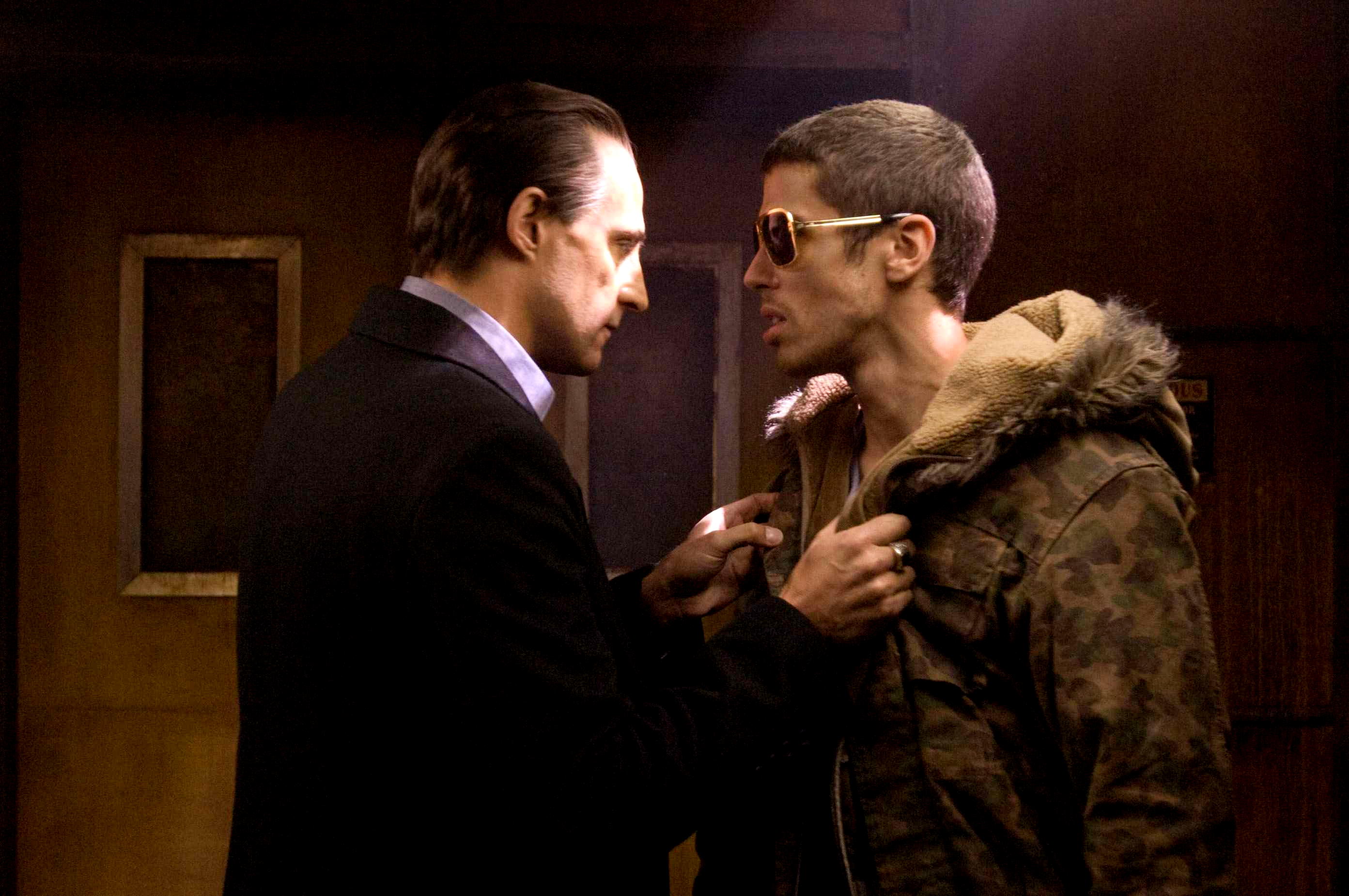 Mark Strong stars as Archie and Toby Kebbell stars as Johnny Quid in Warner Bros Pictures' RocknRolla (2008). Photo credit by Alex Bailey.