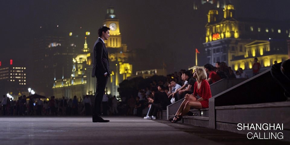 Daniel Henney stars as Sam and Eliza Coupe stars as Amanda in Starz Media's Shanghai Calling (2013)