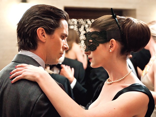 Christian Bale stars as Bruce Wayne/Batman and Anne Hathaway stars as Selina Kyle/Catwoman in Warner Bros. Pictures' The Dark Knight Rises (2012)