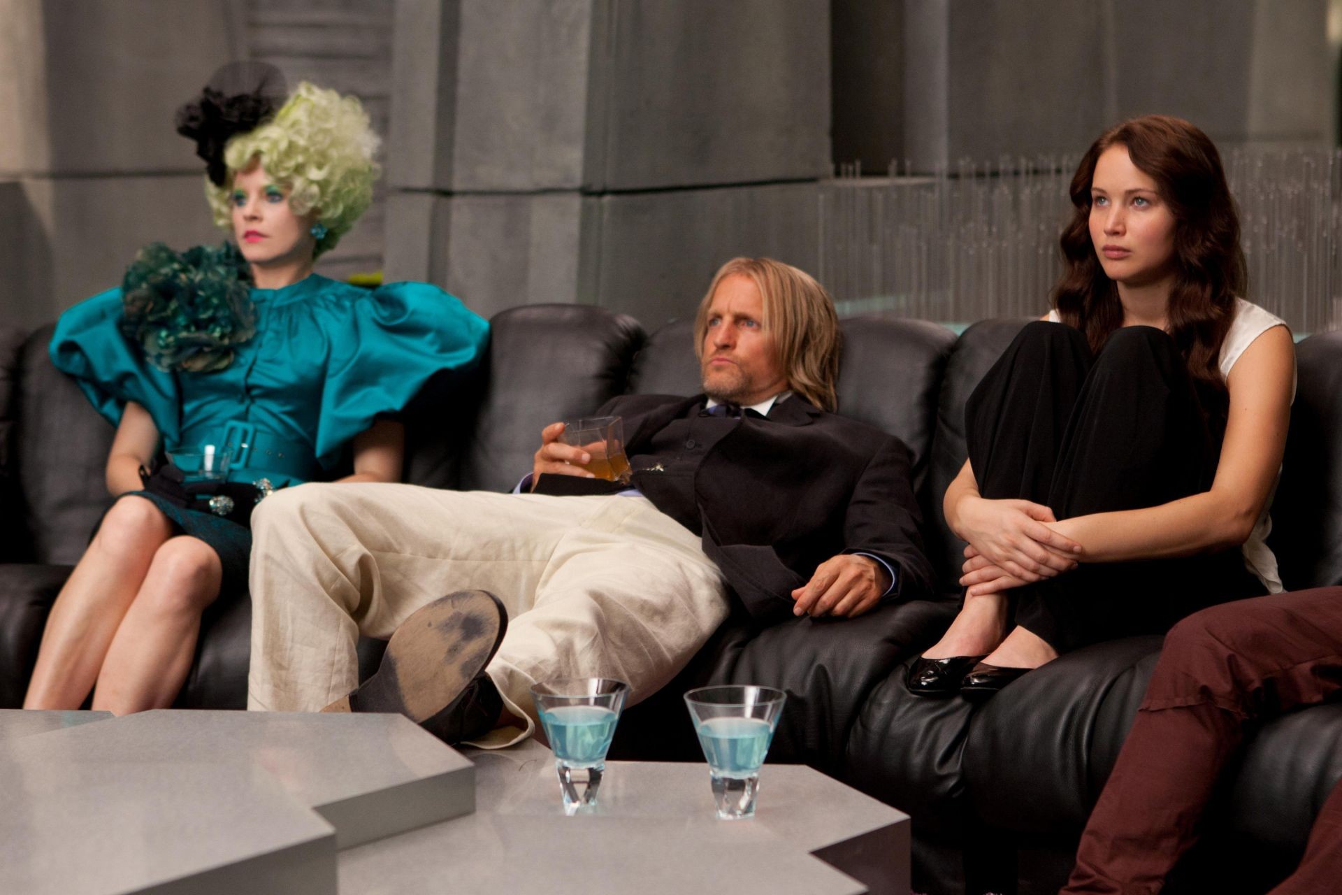 Elizabeth Banks, Woody Harrelson and Jennifer Lawrence in Lionsgate Films' The Hunger Games (2012). Photo credit by Murray Close.