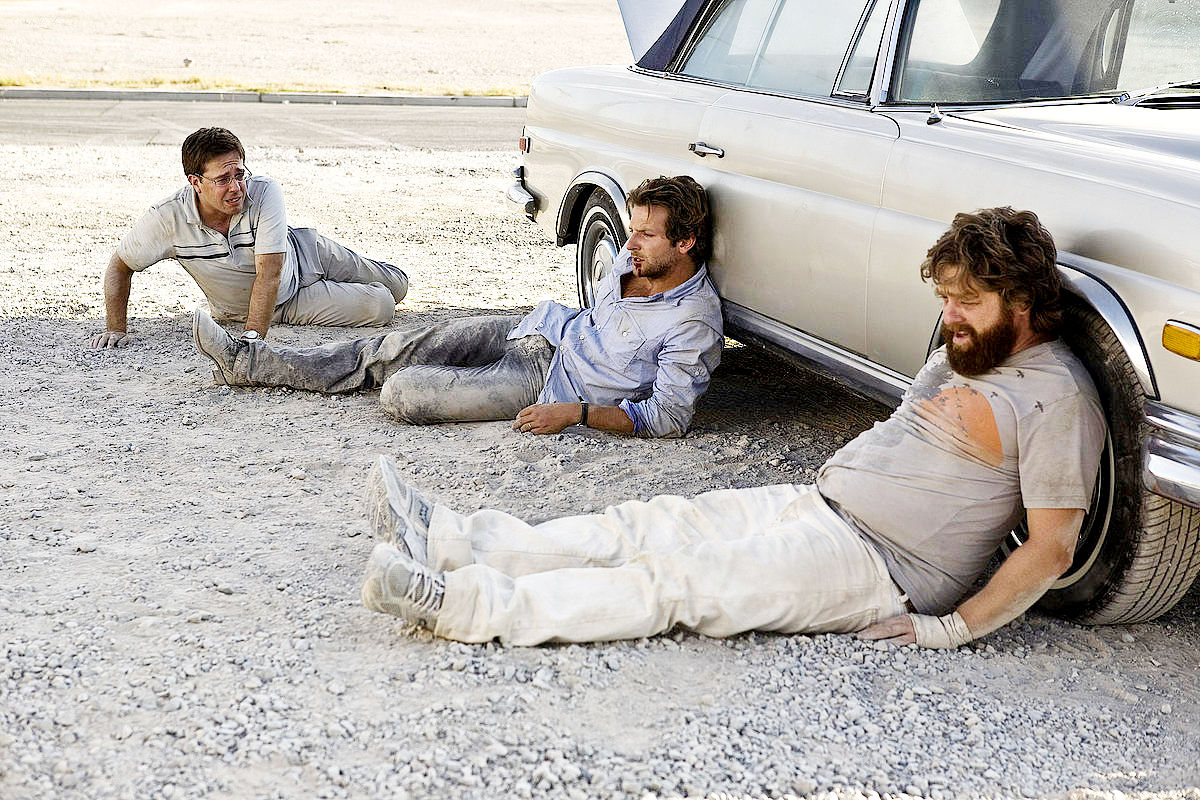 Ed Helms, Bradley Cooper and Zach Galifianakis in Warner Bros. Pictures' The Hangover (2009)