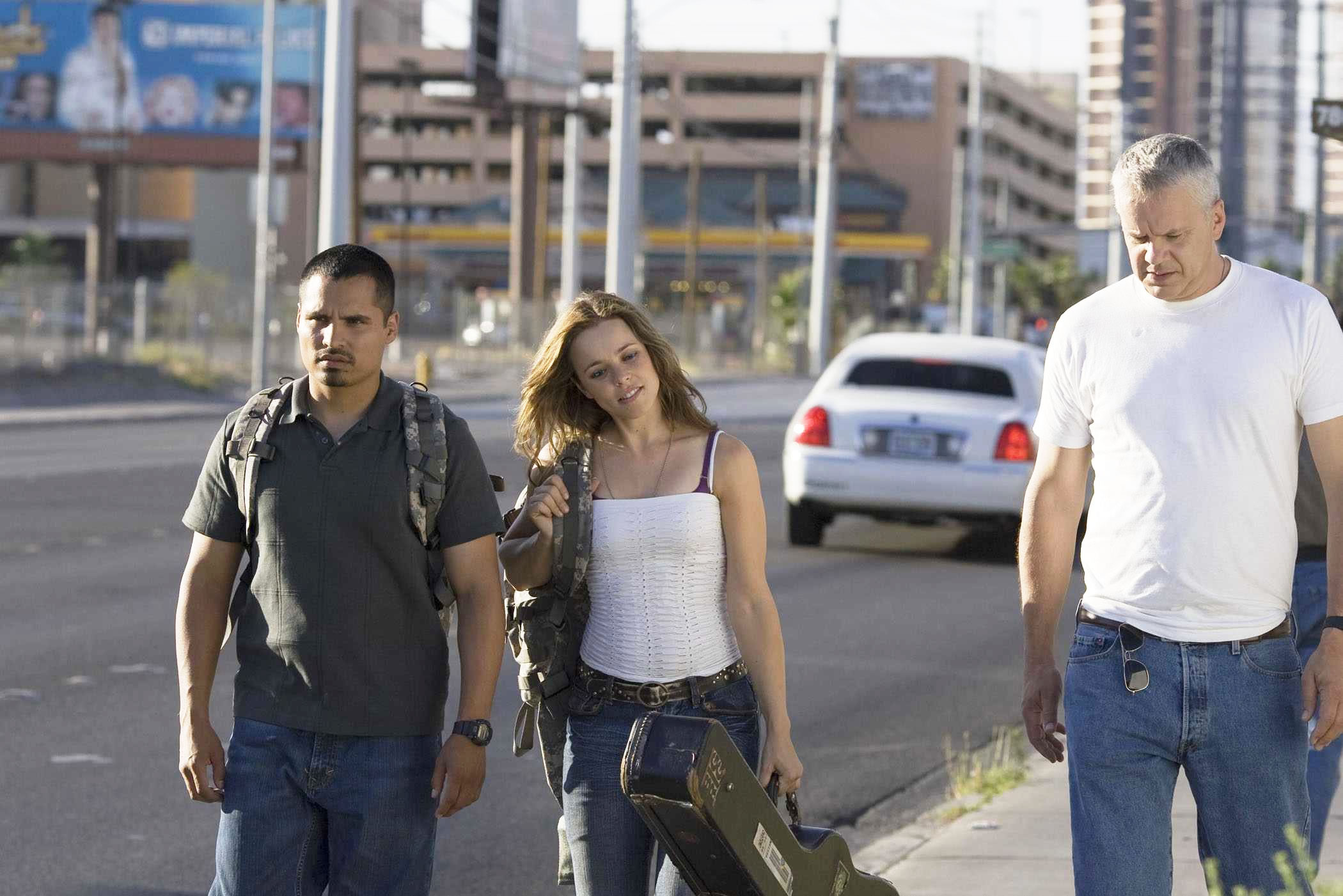 Michael Pena (as TK, left), Rachel McAdams (as Colee) and Tim Robbins (as Cheaver) in THE LUCKY ONES (2008). Photo credit: Matt Dinerstein.