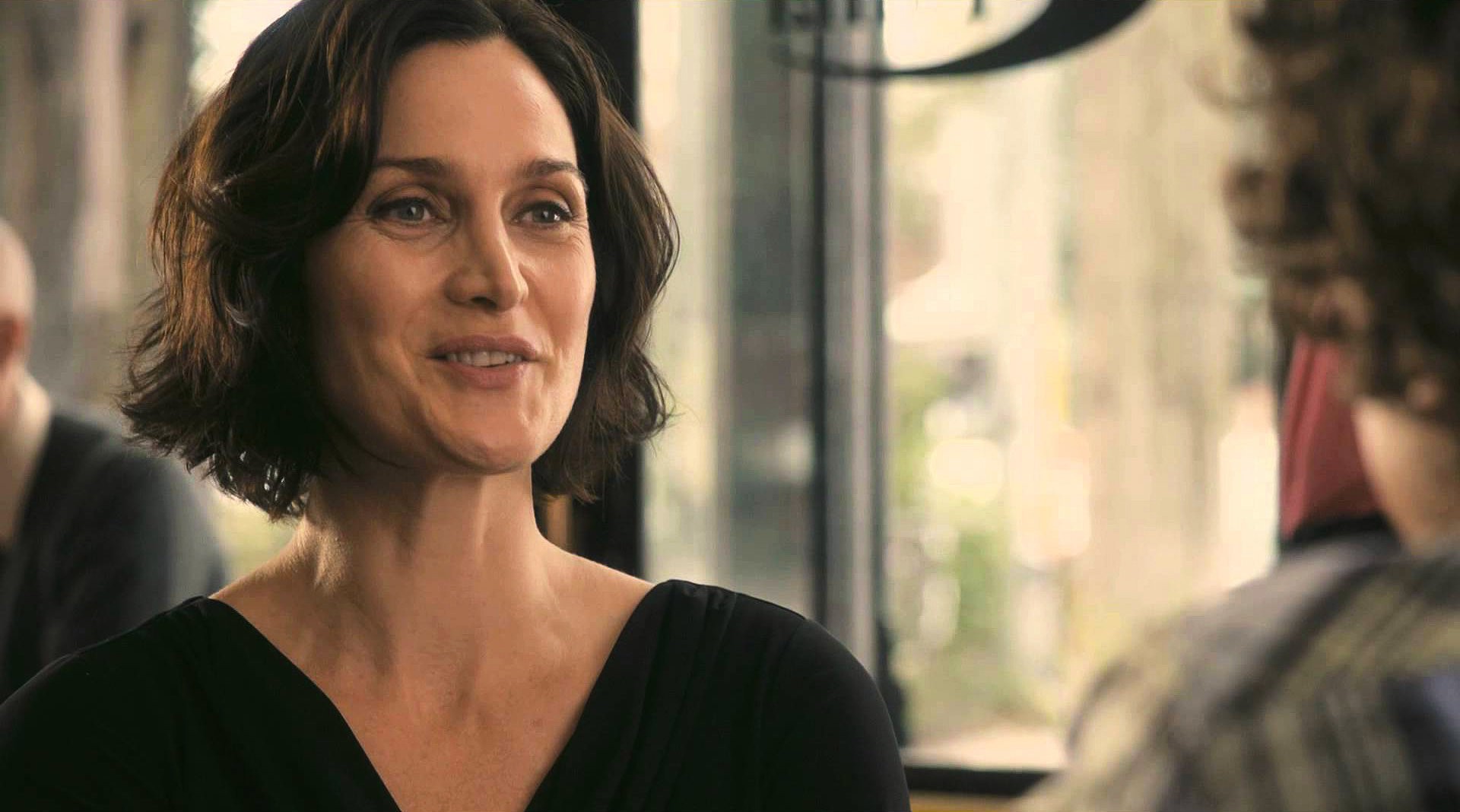 Carrie-Anne Moss stars as Catherine in The Orchard's Treading Water (2015)