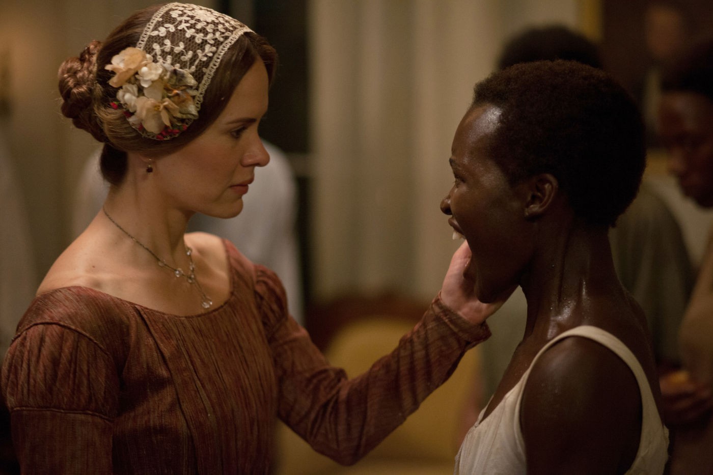 Sarah Paulson stars as Mistress Epps and Lupita Nyong'o stars as Patsey in Fox Searchlight Pictures' 12 Years a Slave (2013)