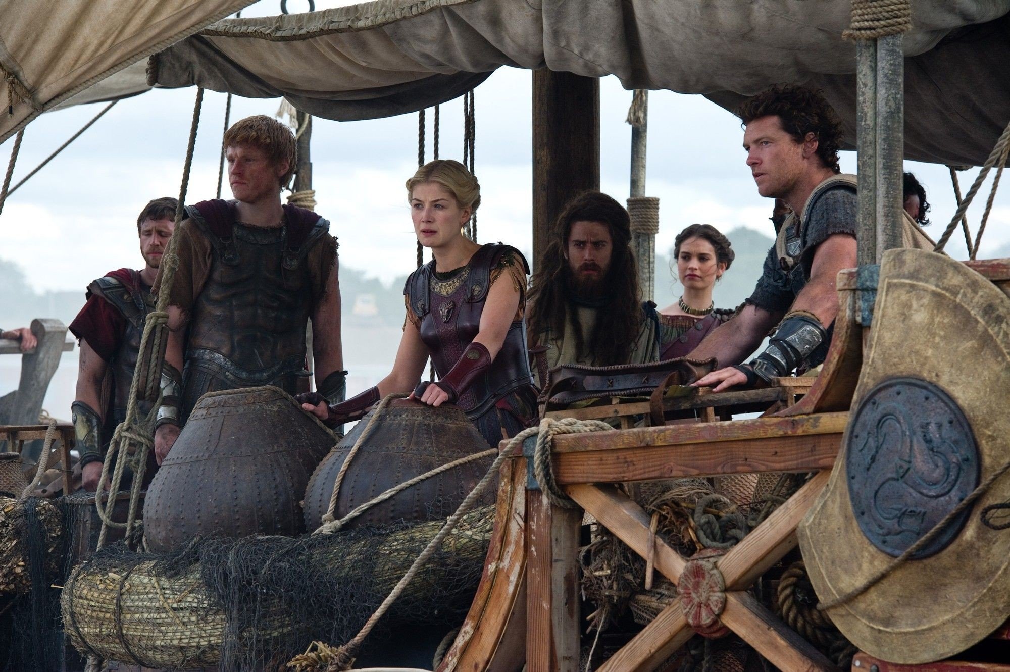 Rosamund Pike, Toby Kebbell, Lily James and Sam Worthington in Warner Bros. Pictures' Wrath of the Titans (2012). Photo credit by Jay Maidment.