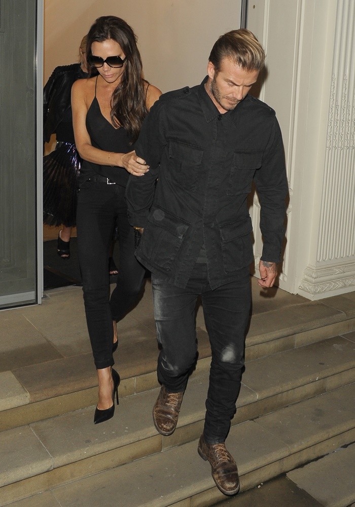 Victoria Beckham Led Out of Her Own Shop by David Beckham