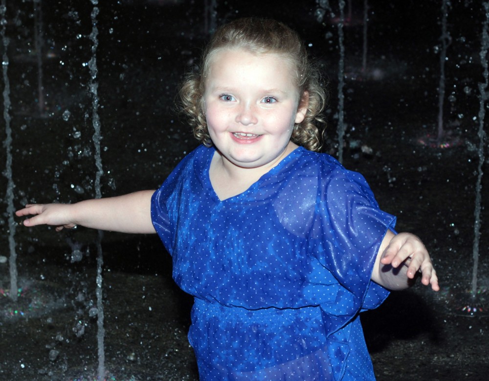 Alana Thompson Plays in The Water Fountains