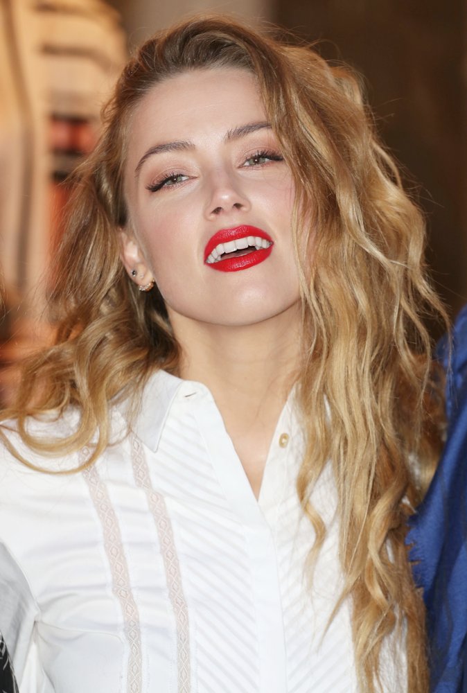 Amber Heard;<br>Amber Heard Unveils The Alice in Wonderland Themed Window for Temperley