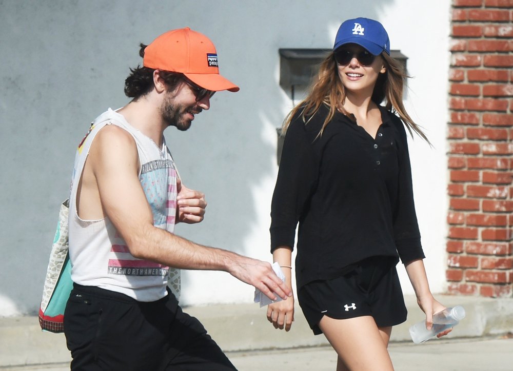 Elizabeth Olsen Takes A Long Walk with Robbie Arnett