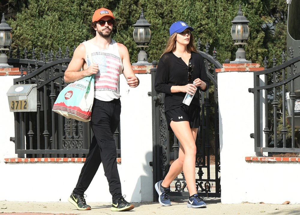 Elizabeth Olsen Takes A Long Walk with Robbie Arnett