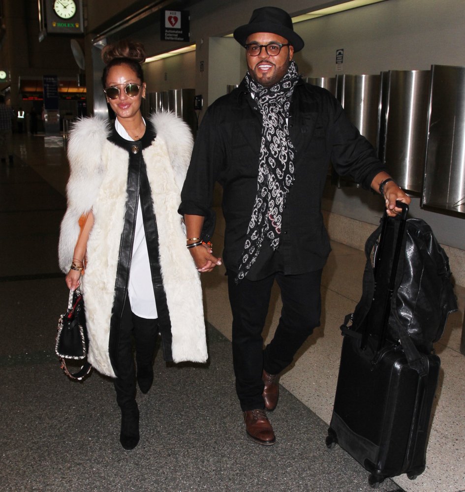 Adrienne Bailon and Israel Houghton Depart from Los Angeles International Airport