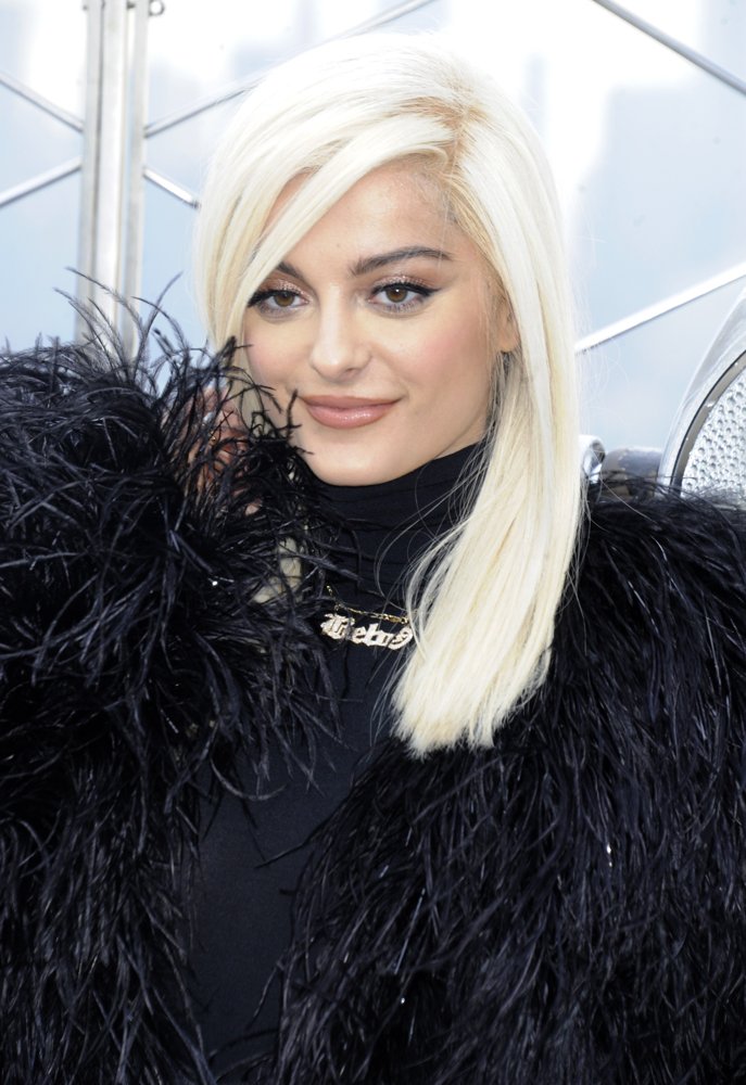 Bebe Rexha Attends A Photocall at The Empire State Building