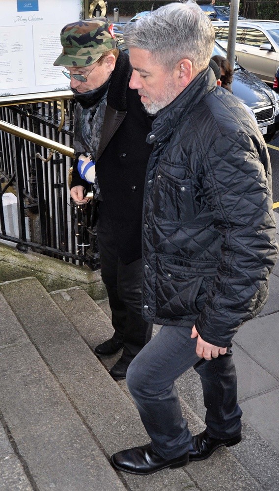 Bono Arriving at The Cliff Townhouse Restaurant