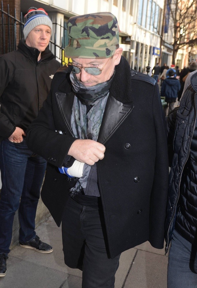 Bono Arriving at The Cliff Townhouse Restaurant