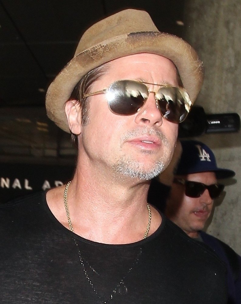 Brad Pitt Arrives at Los Angeles International Airport