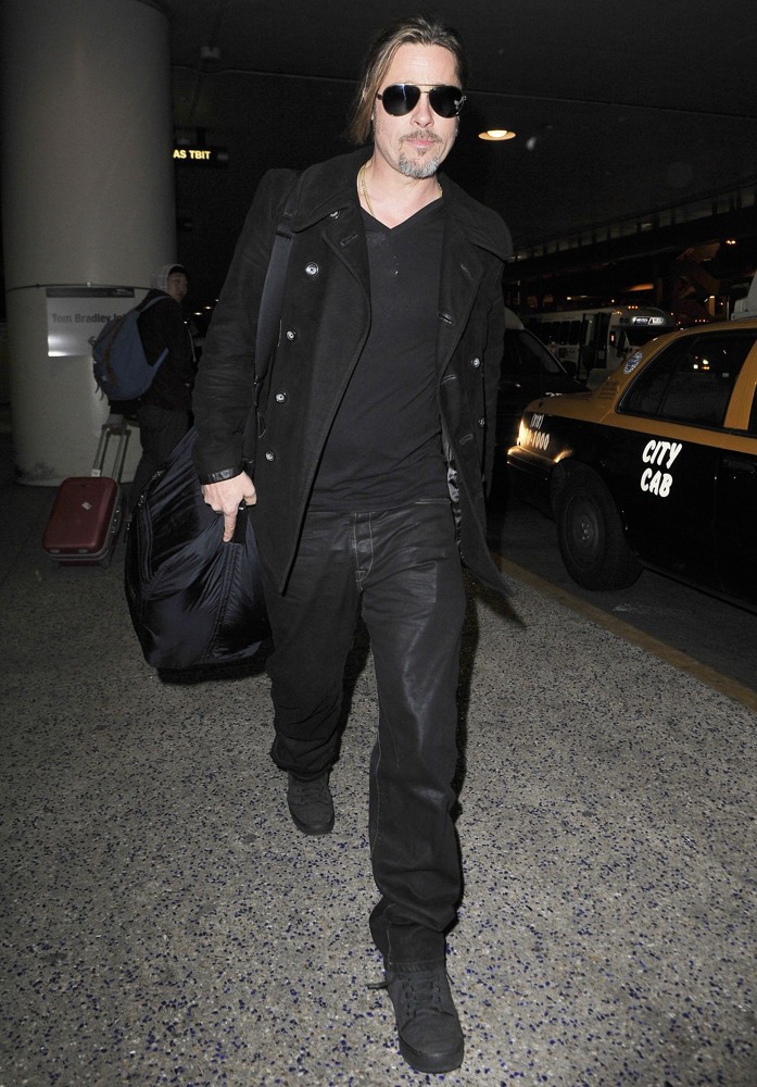 Brad Pitt Arriving at LAX After Flying in from London