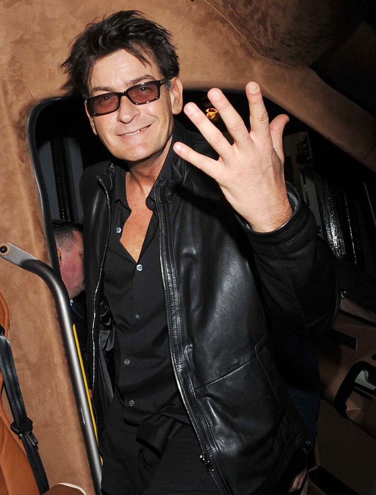 Charlie Sheen in Good Spirits as He Boards His Bus After Leaving The Olympia Theatre