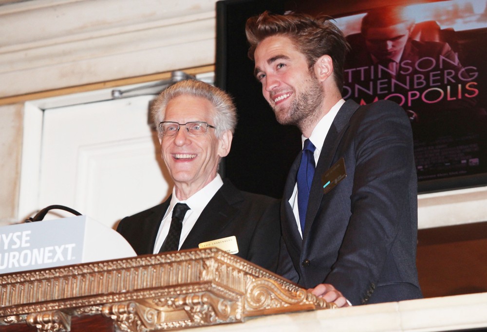 David Cronenberg and Robert Pattinson Visit The New York Stock Exchange to Ring The Opening Bell