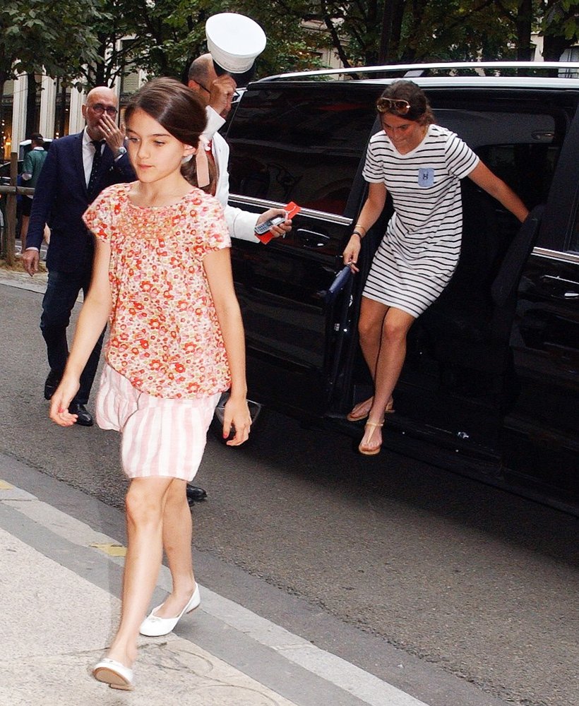 Suri Cruise and Katie Holmes Arrive at Hotel in Paris During Paris Fashion Week