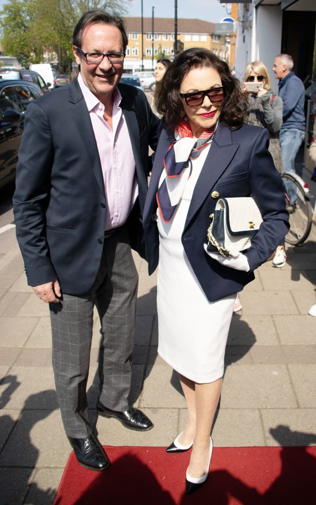 Joan Collins Opens Charity Shop
