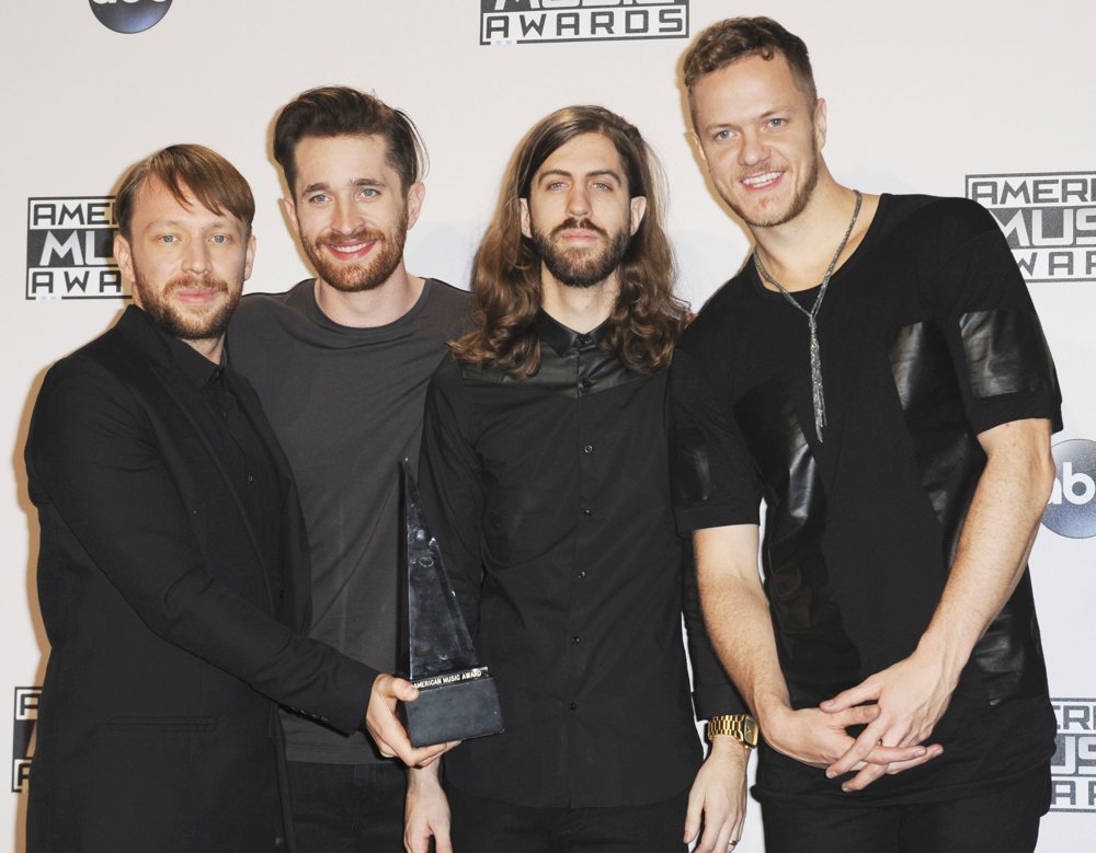 Imagine dragons новое. Группа imagine Dragons. Эндрю Блэк imagine Dragons. Имэйджин Драгонс 2022. Солист Имэйджн Дрэгонс.