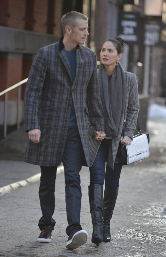 Joel Kinnaman and Olivia Munn walking in Tribeca