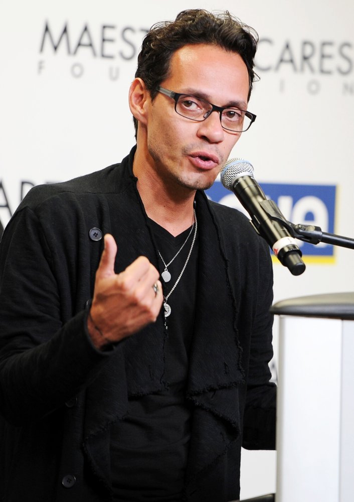 Marc Anthony Presents A Check to The Maestro Cares Foundation