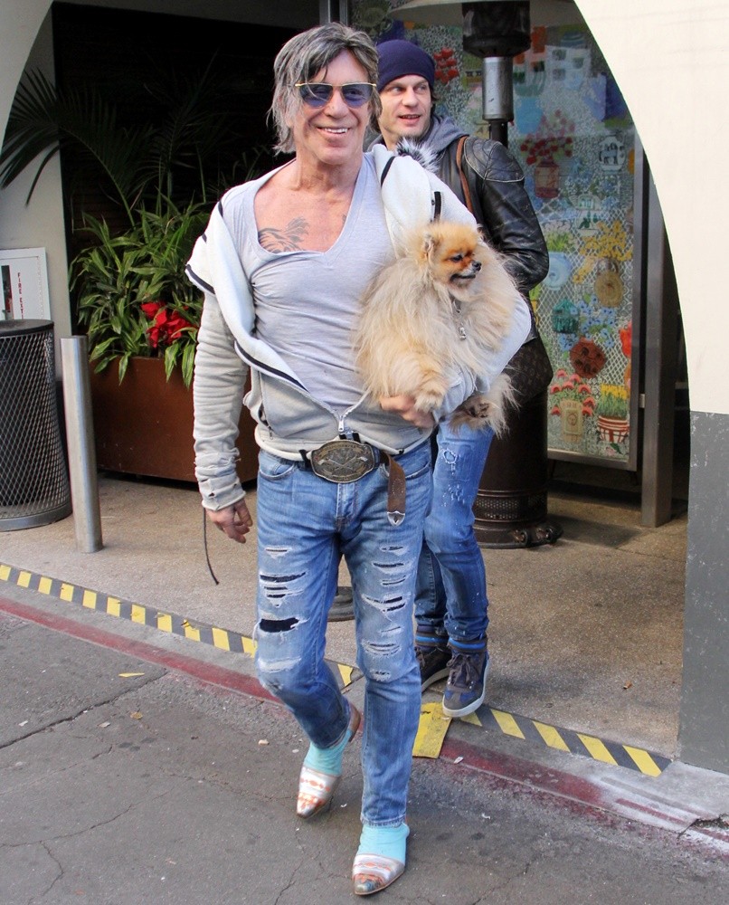 Mickey Rourke Carries His Pet Dog as He Leaves Cafe Roma on Christmas Eve
