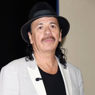 Carlos Santana in Carlos Santana Donates Instruments to Opportunity Village's Music Program