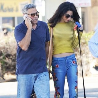George Clooney and Amal Alamuddin Take Their Hound Dog on The Set of Suburbicon