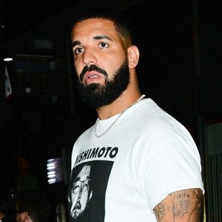 Drake Seen Leaving Playboy Club