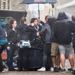 Felicity Jones Films The Aeronauts in Pouring Rain