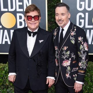Elton John, David Furnish in 77th Annual Golden Globes - Arrivals
