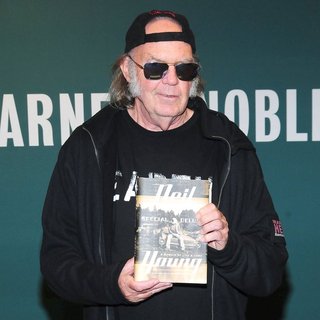Neil Young Signs Copies of His Book Special Deluxe: A Memoir of Life and Cars