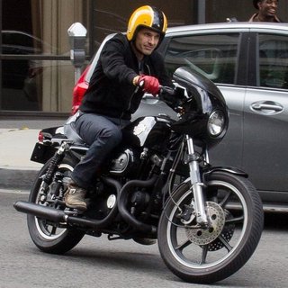 Olivier Martinez in Olivier Martinez Running Errands on His Bike