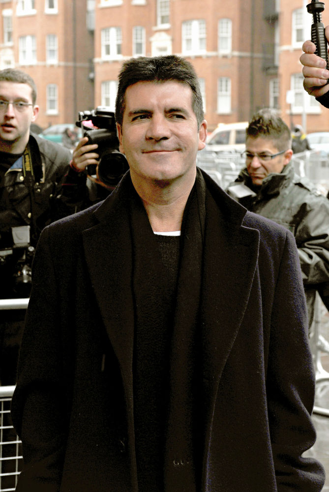 Simon Cowell Shares Devastation Post Father's Death