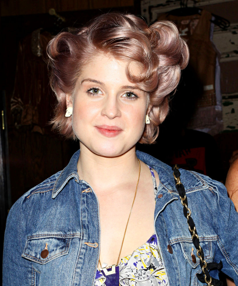 Kelly Osbourne Puts Her Diet Aside While Vacationing in U.K.