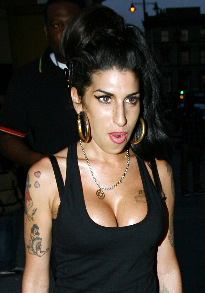 Amy Winehouse Reportedly Rekindles Romance With Reg Traviss
