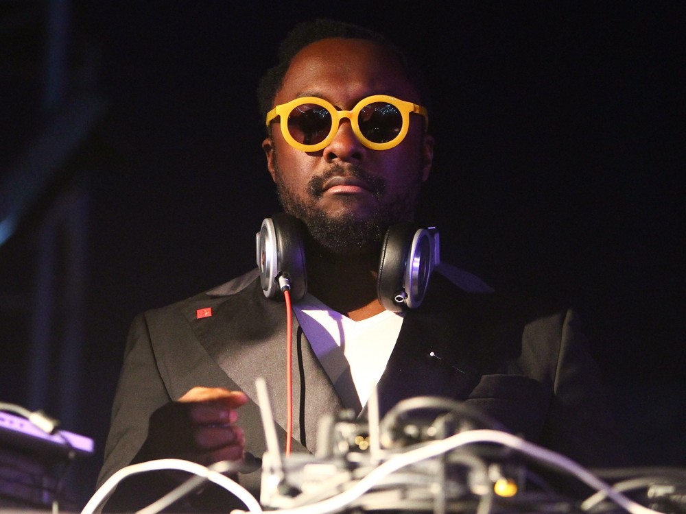 will.i.am Serving as DJ During A Set at The EF Summeranza Student Exchange Event