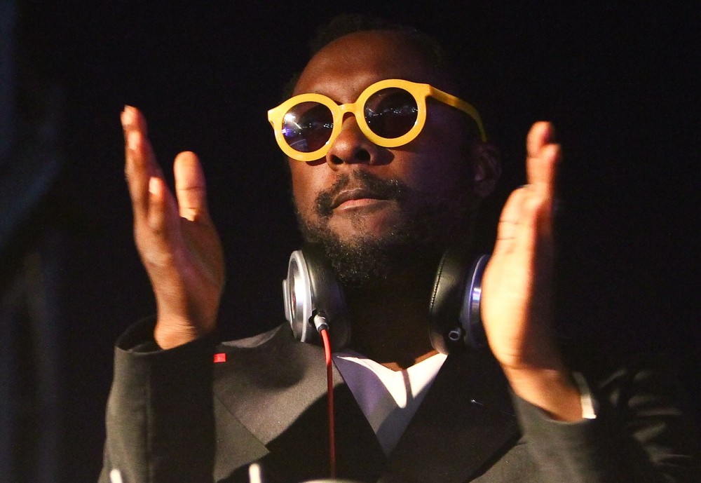 will.i.am Serving as DJ During A Set at The EF Summeranza Student Exchange Event