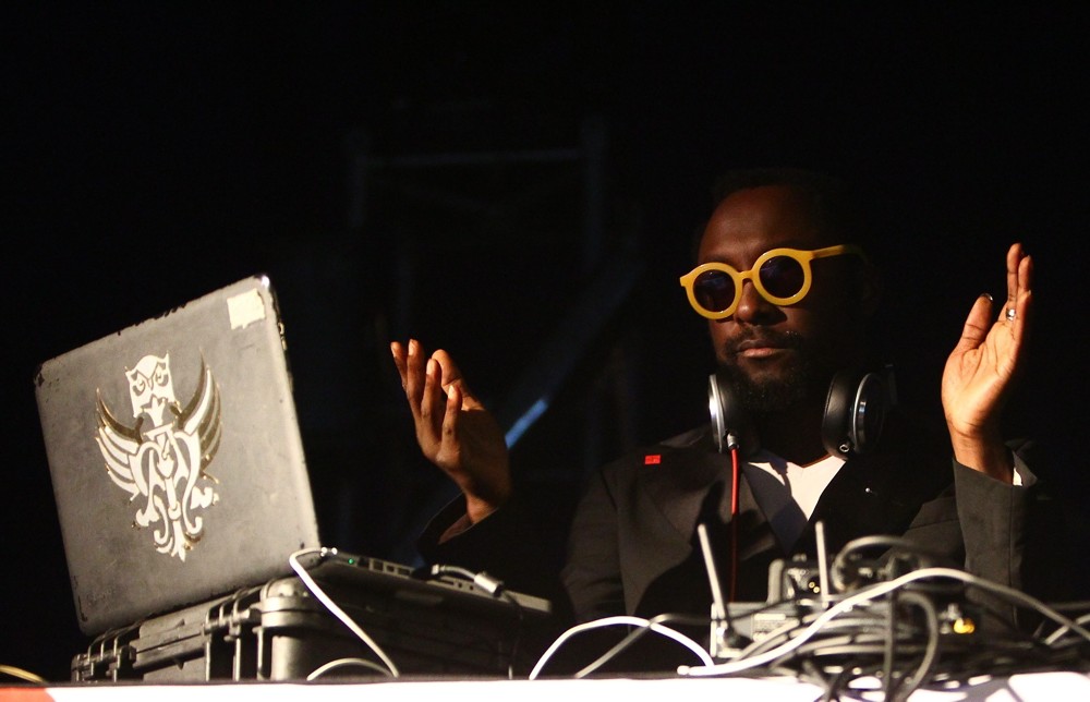 will.i.am Serving as DJ During A Set at The EF Summeranza Student Exchange Event